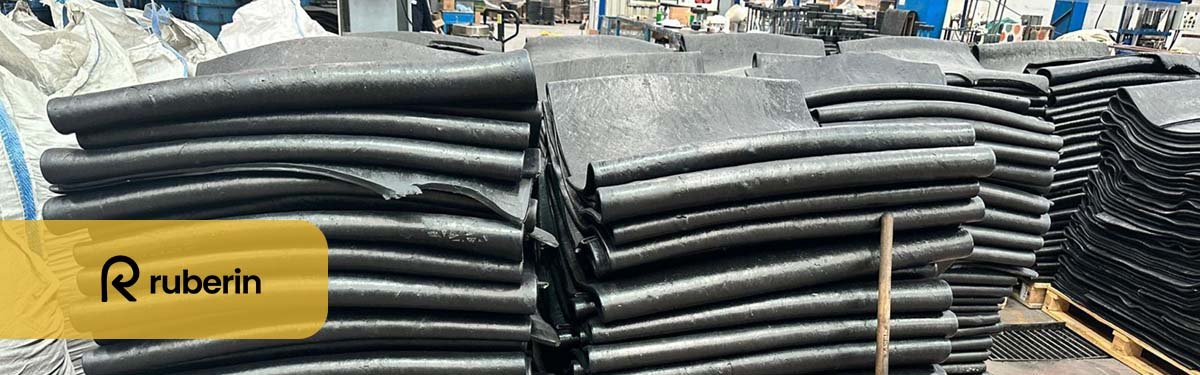 Stacked rubber compound sheets ready for industrial use, processed and prepared by Ruberin