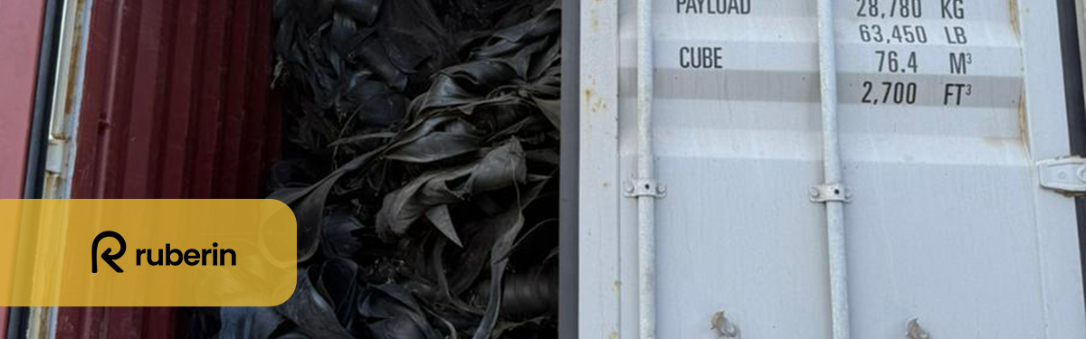 Interior of a shipping container filled with steel friction rubber scrap, showcasing weight and volume specifications for industrial export.
